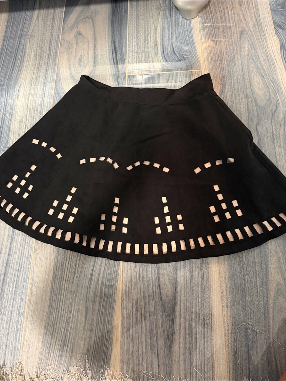 Black Laser-Cut Circle Skirt with Geometric Cutouts